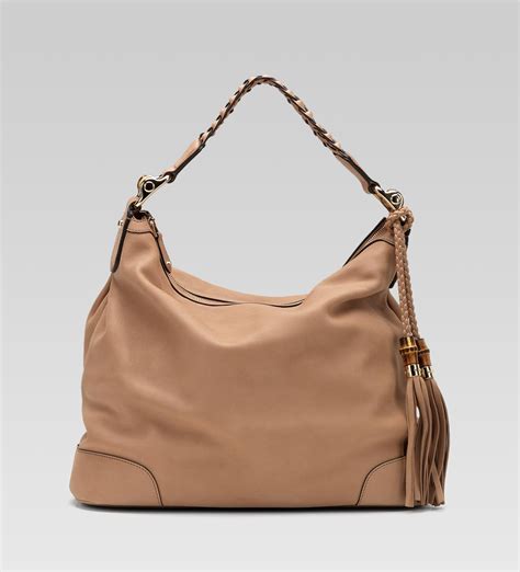 gucci heritage hobo bag|Gucci hobo bag with tassels.